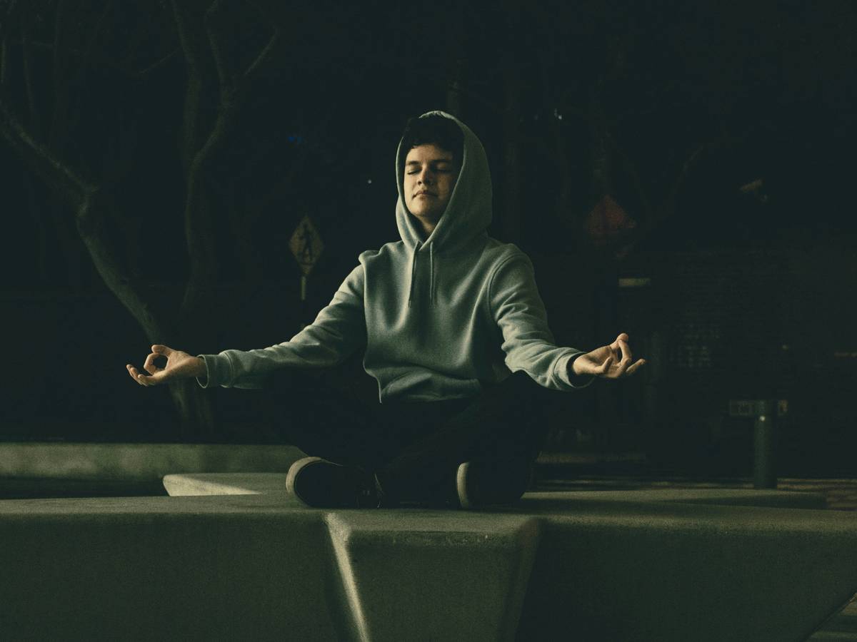 Man using diaphragmatic breathing as relaxation technique insomnia relief what are proven strategies