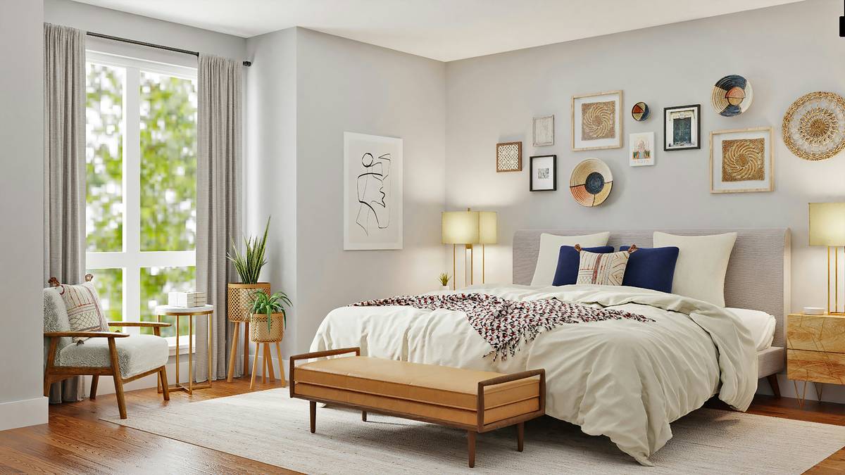 A person using a sleep hygiene tool insomnia relief practice with a dimmed bedside lamp, journal, and white noise machine on a nightstand
